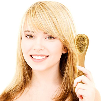 Woman Holding Face Dry Brush
