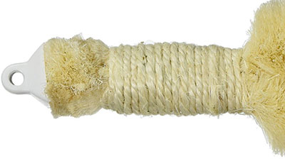 Close-Up of Ergonomic Handle of Earth Therapeutics Fuzz Brush for Dry Brushing Skin